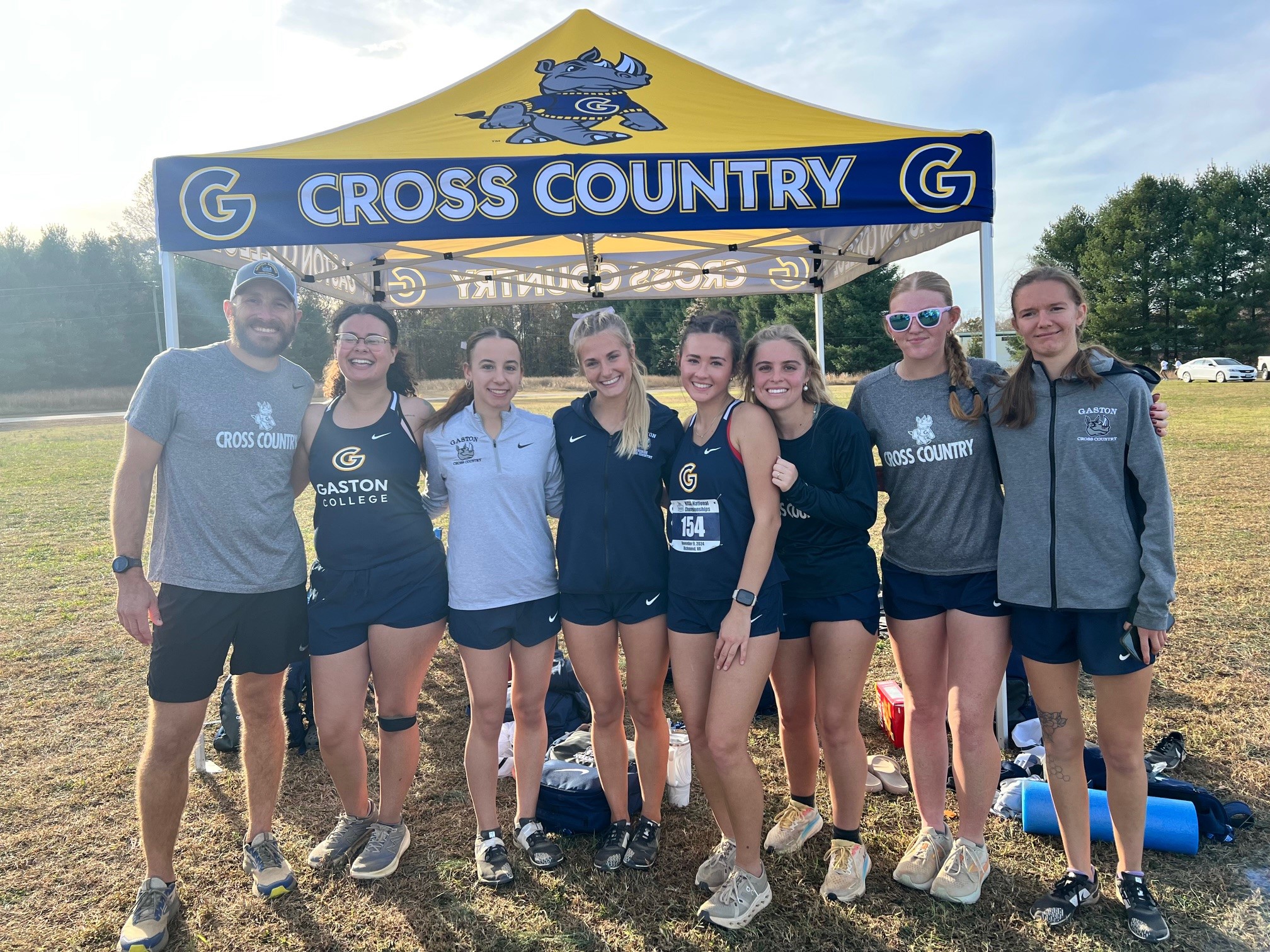 Gaston College cross country coach Kody Kubbs (far left) and his team finished 23rd in the NJCAA national championship meet on Saturday.