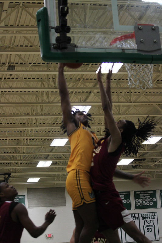 Gaston College's Kush Carter on his way to impressive dunk in traffic during Monday's 104-91 win over USC Salkehatchie at Gastonia's Ashbrook High School.